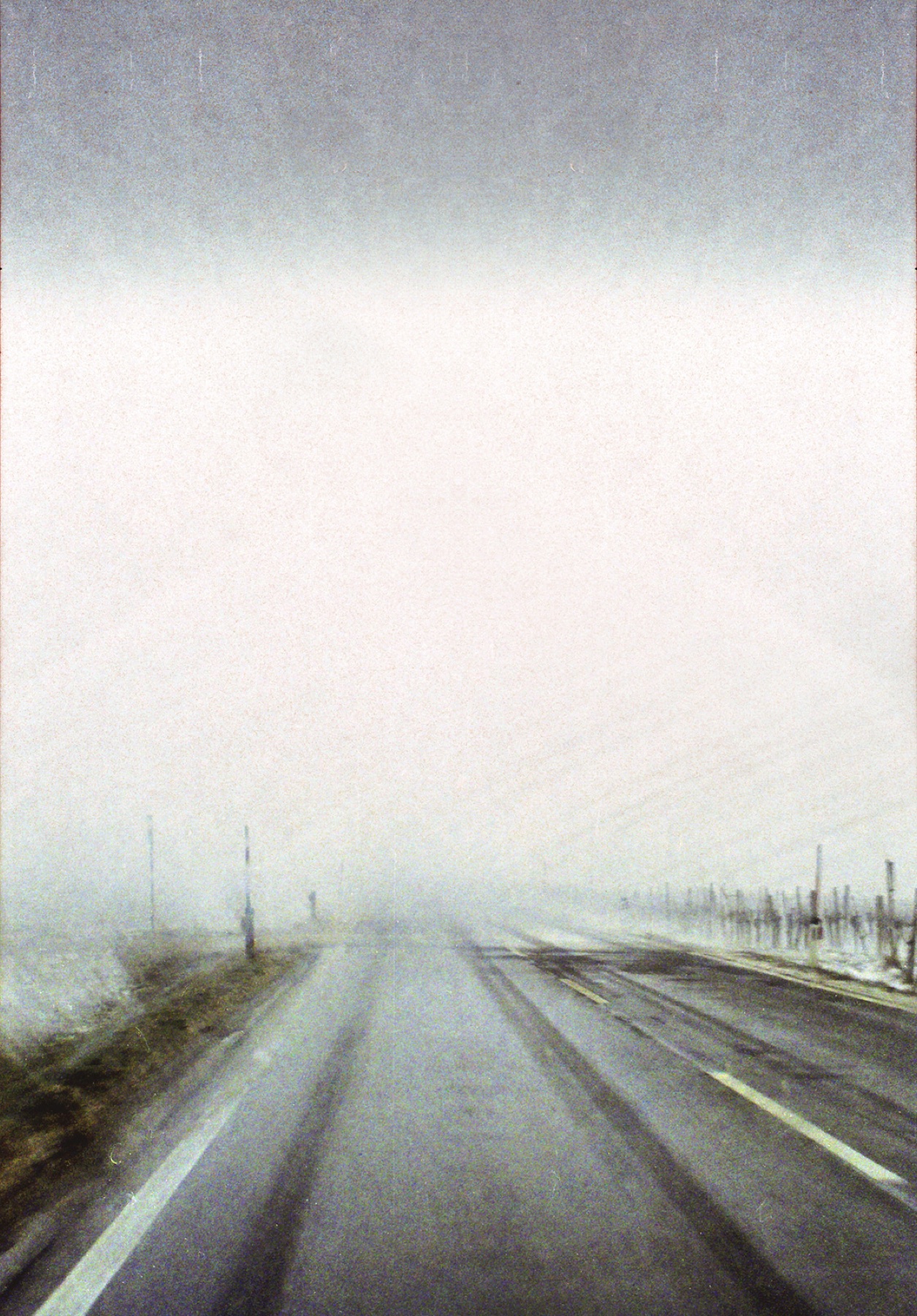 Road disappearing into light