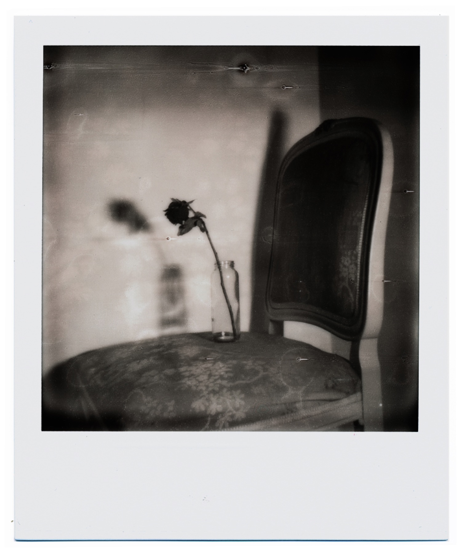 Polaroid still life with chair